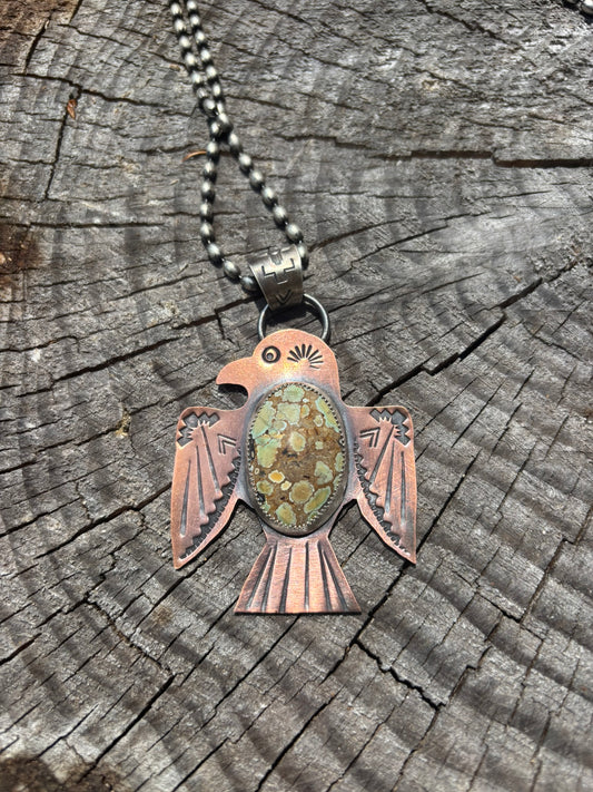 copper thunderbird and turquoise pendant