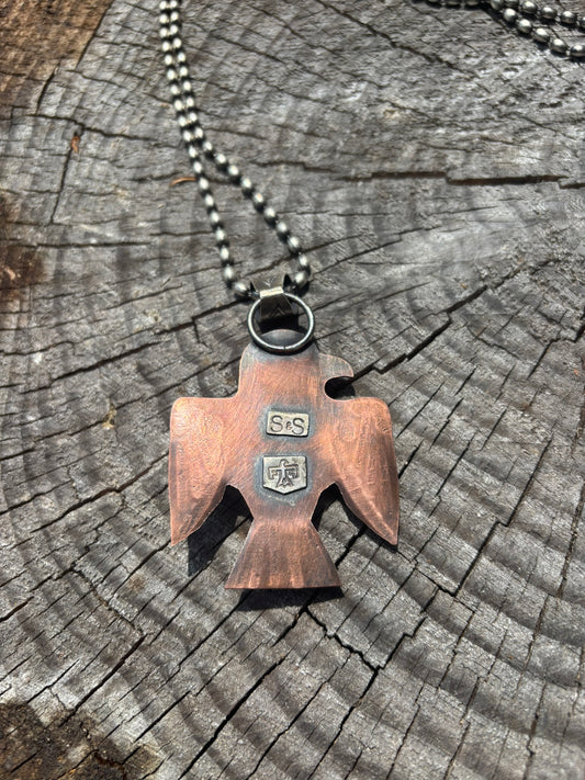 copper thunderbird and turquoise pendant